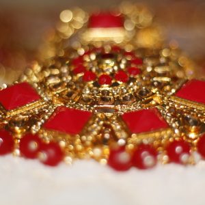 gold and red beaded necklace