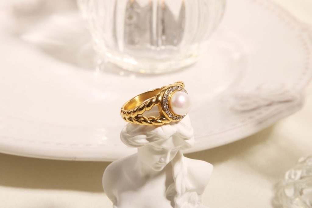 a wedding ring on a table