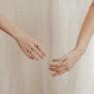 two hands reaching out towards each other