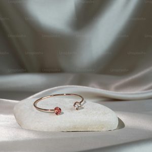 a close up of a ring on a rock