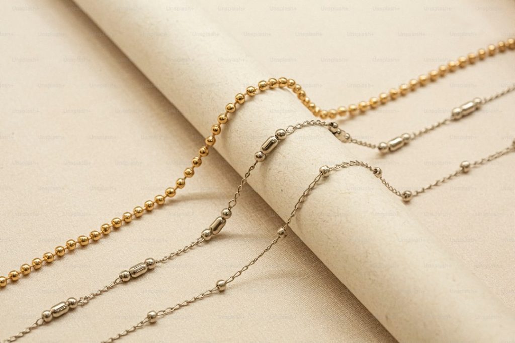 a roll of paper with a chain on top of it