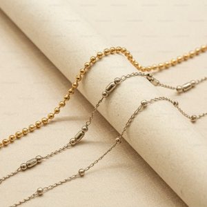 a roll of paper with a chain on top of it